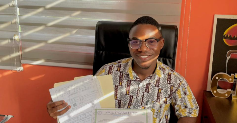 Gonet Academy CEO, Mohammed Kerkulah, displays the newly acquired MOE accreditation