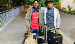 Levi welcomes Marcus upon his arrival in Kigali, Rwanda