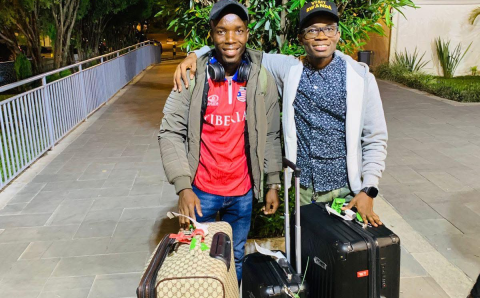 Levi welcomes Marcus upon his arrival in Kigali, Rwanda