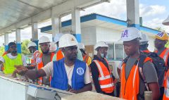 A LWSC expert take students through some of the water safety procedures at the Corporation’s treatment Plant in White Plain, Rural Montserrado County