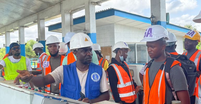 A LWSC expert take students through some of the water safety procedures at the Corporation’s treatment Plant in White Plain, Rural Montserrado County