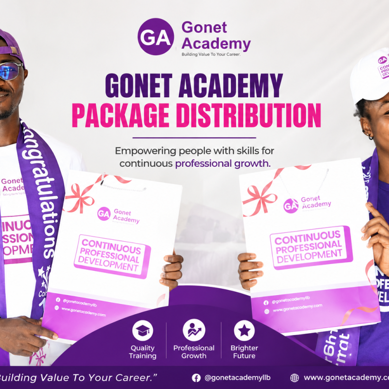 Two students smile as they received their packages on Monday